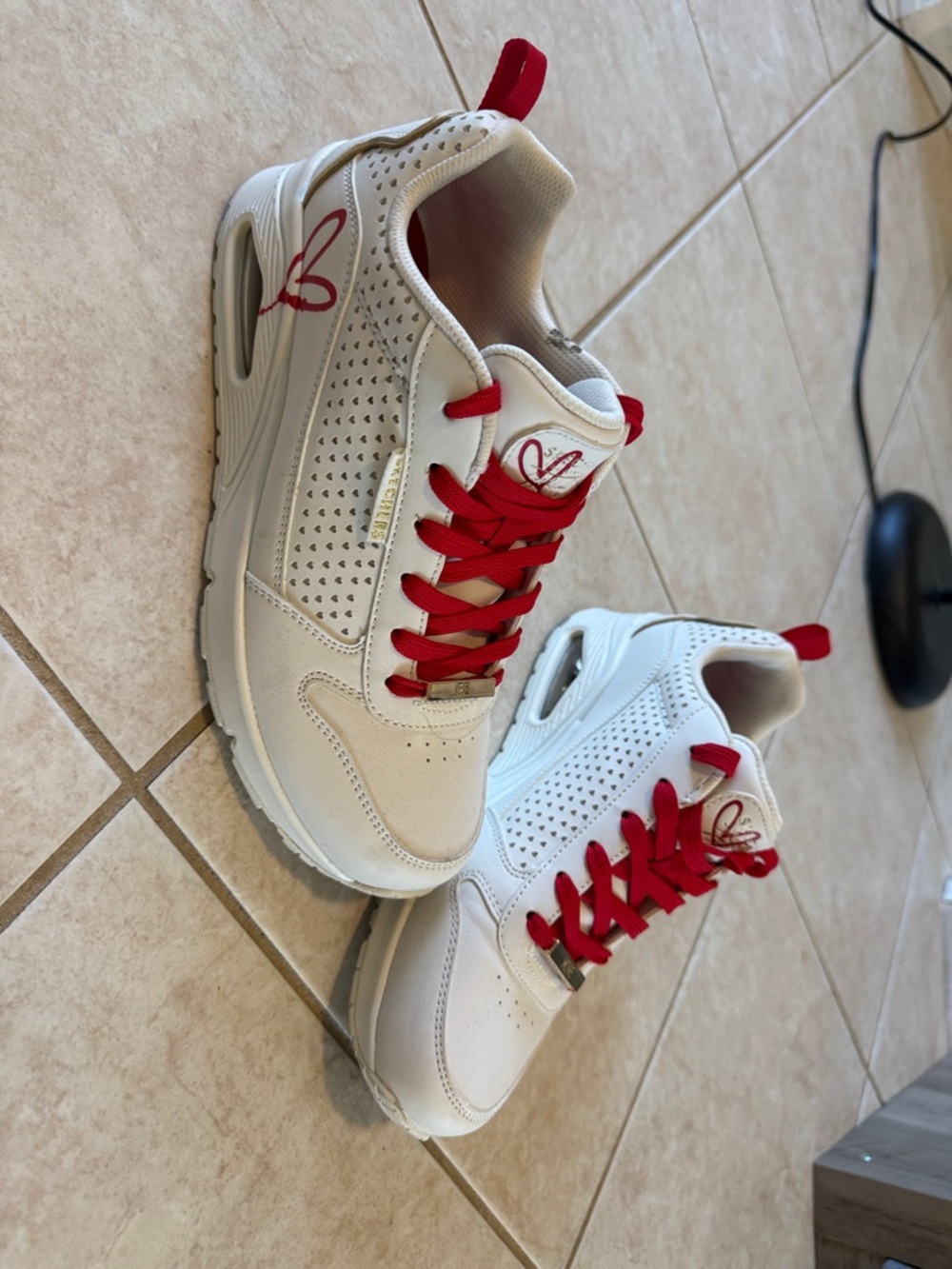 White Sneakers with Red Accents